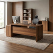 Walnut L-shaped executive desk with credenza return, dual monitor setup, black mesh office chair, and built-in bookshelf - RAMA Office Furniture
